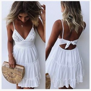 White summer dress / never worn / open back